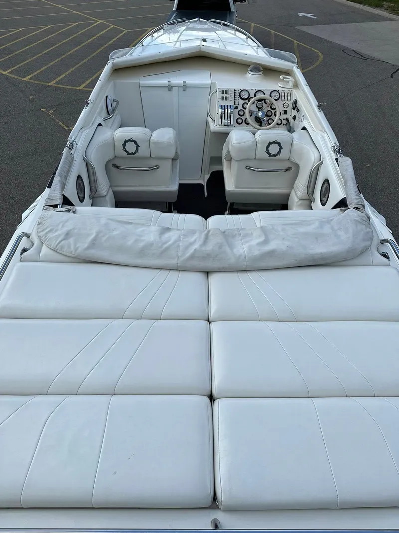 Slide: The Image of 1994 Fountain 35 Lightning boat interior with white leather seating and dashboard view. - 10