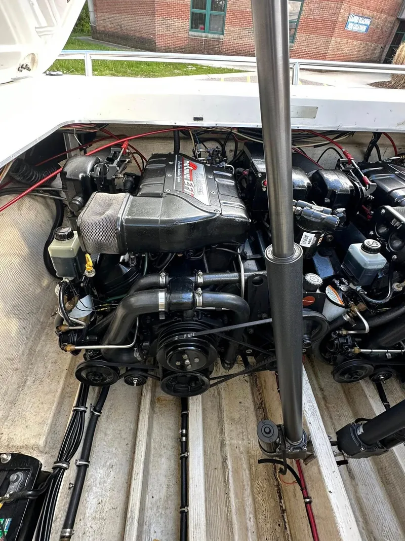 Slide: The Image of 1994 Fountain 35 Lightning engine compartment with detailed mechanical components. - 23