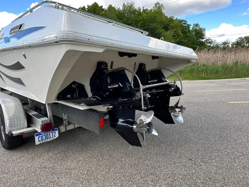 Slide: The Image of 1994 Fountain 35 Lightning boat on trailer, featuring dual MerCruiser engines. - 8