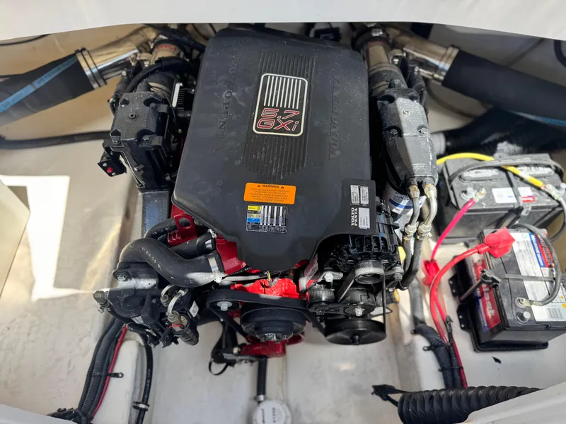 Slide: The Image of 2004 Chaparral 265 SSi engine compartment with Volvo Penta 8.1 GXI engine and battery setup. - 11