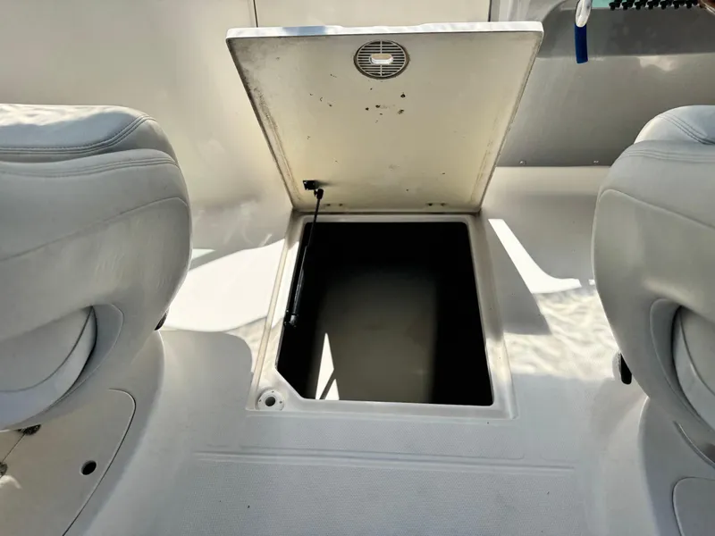 Slide: The Image of Open storage compartment on 2004 Chaparral 265 SSi boat interior. - 15