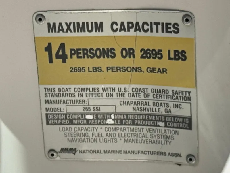 Slide: The Image of Capacity label for 2004 Chaparral 265 SSi, max 14 persons or 2695 lbs. - 24
