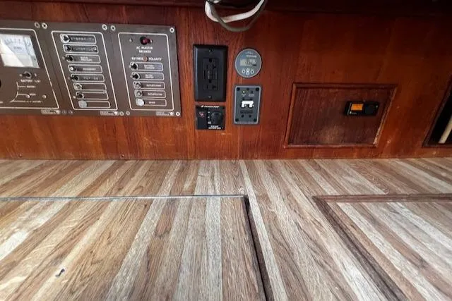 Slide: The Image of Control panel and outlets on 1980 CAL 39 MK II Sloop with wood finish. - 15