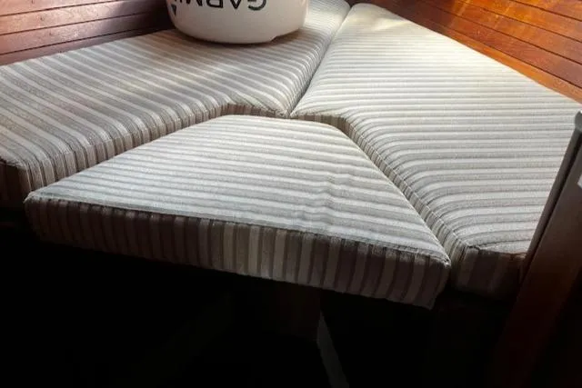 Slide: The Image of Striped cushions on a CAL 39 MK II Sloop, 1980, wooden seating area. - 20