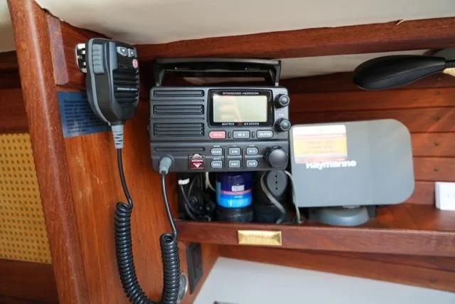 Slide: The Image of VHF radio and navigation equipment on 1980 CAL 39 MK II Sloop sailboat. - 28