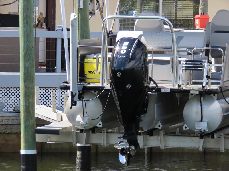 Slide: The Image of 2023 Viaggio DIAMANTE 23S pontoon boat with powerful outboard motor at dock. - 25