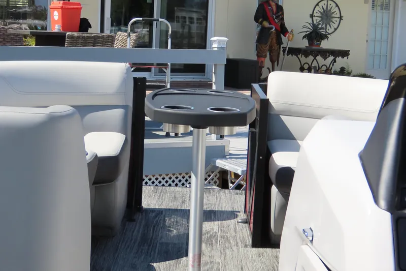 Slide: The Image of 2023 Viaggio DIAMANTE 23S boat interior with seating and cup holders. - 30