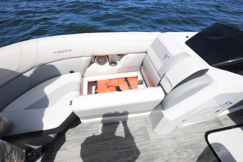 Slide: The Image of 2023 Viaggio DIAMANTE 23S boat interior with storage compartment and life jacket. - 6