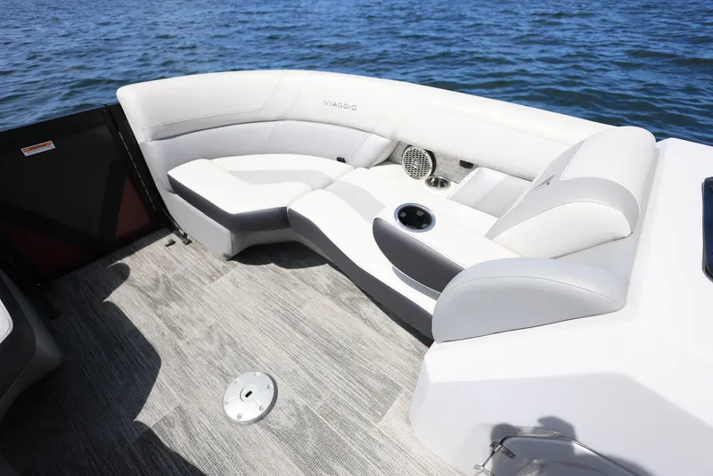Slide: The Image of Luxurious seating on 2023 Viaggio DIAMANTE 23S boat, overlooking serene water. - 7