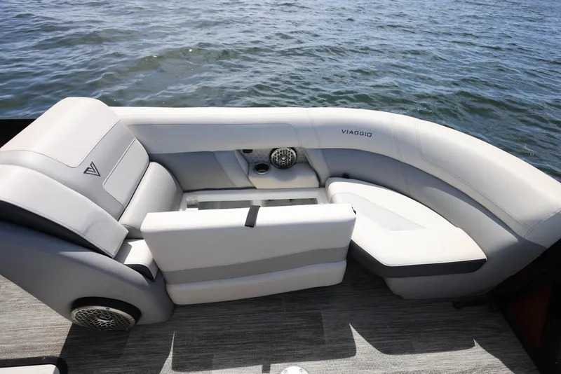 Slide: The Image of Luxurious seating on 2023 Viaggio DIAMANTE 23S boat, overlooking serene water. - 8