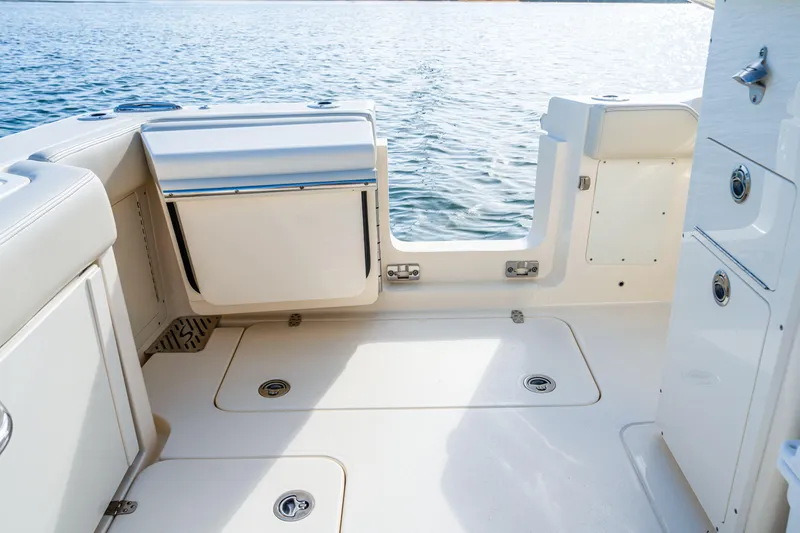 Slide: The Image of 2026 Scout 288 LXF boat interior with sleek design and ocean view. - 35