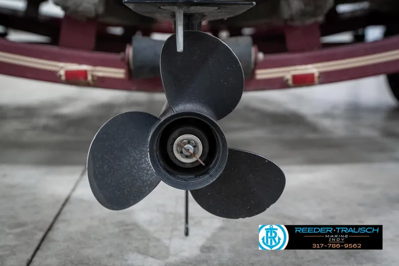 Slide: The Image of Propeller of a 1997 Lund 1700 Pro Angler boat, close-up view. - 45