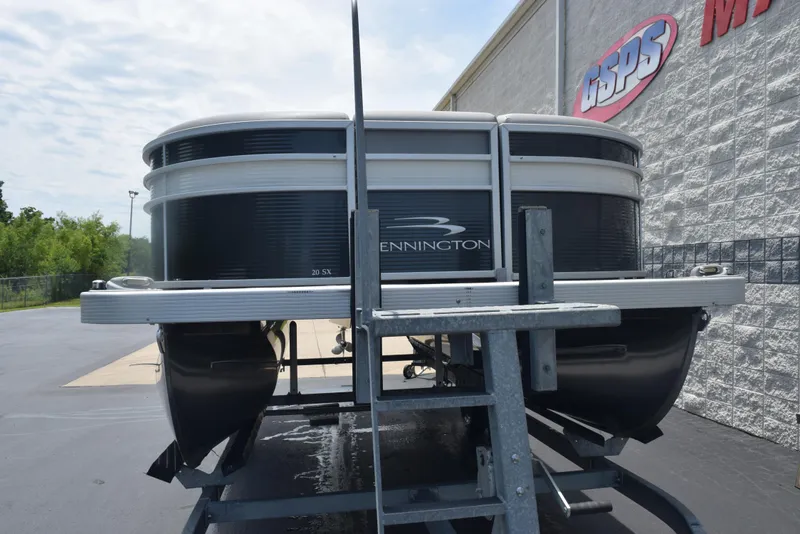 Slide: The Image of 2020 Bennington SX 20 SSX pontoon boat on trailer, parked outside dealership. - 3