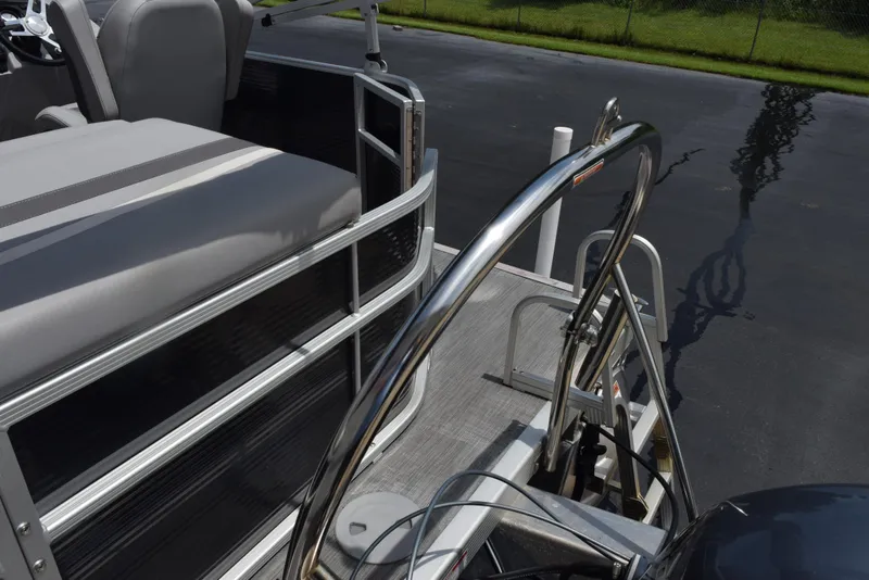 Slide: The Image of 2020 Bennington SX 20 SSX pontoon boat with sleek seating and stainless steel railings. - 7