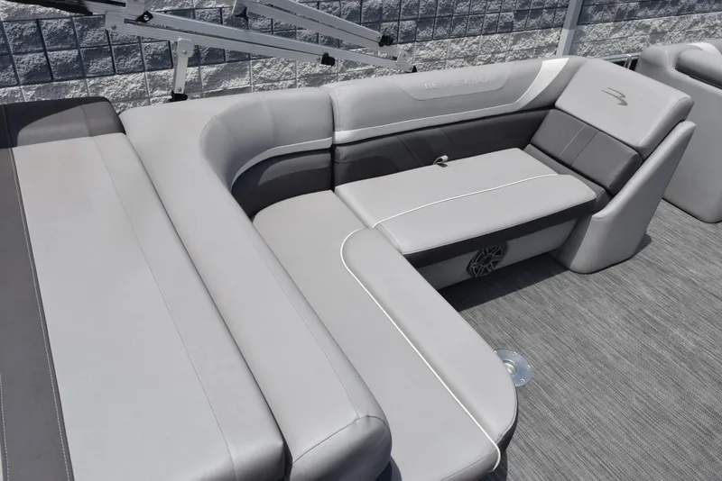 Slide: The Image of Luxurious seating on 2020 Bennington SX 20 SSX pontoon boat, featuring sleek gray upholstery. - 8