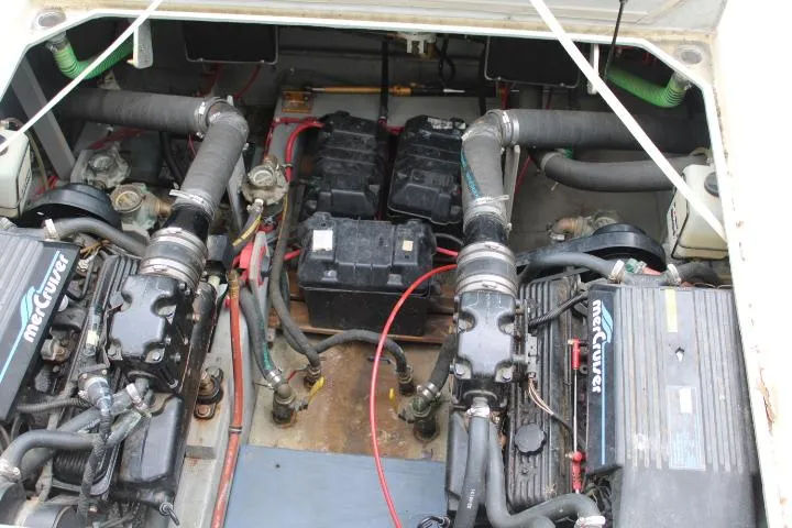 Slide: The Image of Engine compartment of a 1990 Tollycraft Sport Sedan with dual MerCruiser engines. - 17