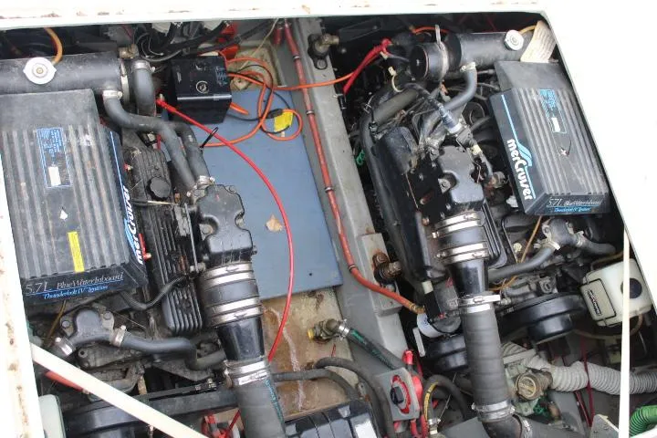 Slide: The Image of Engine compartment of a 1990 Tollycraft Sport Sedan with twin MerCruiser engines. - 18