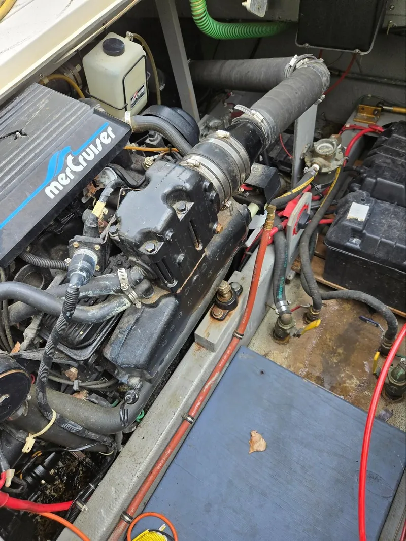 Slide: The Image of Engine compartment of a 1990 Tollycraft Sport Sedan with MerCruiser components. - 20