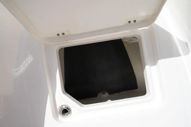 Slide: The Image of Storage compartment on 2021 Robalo R230 Center Console boat. - 28