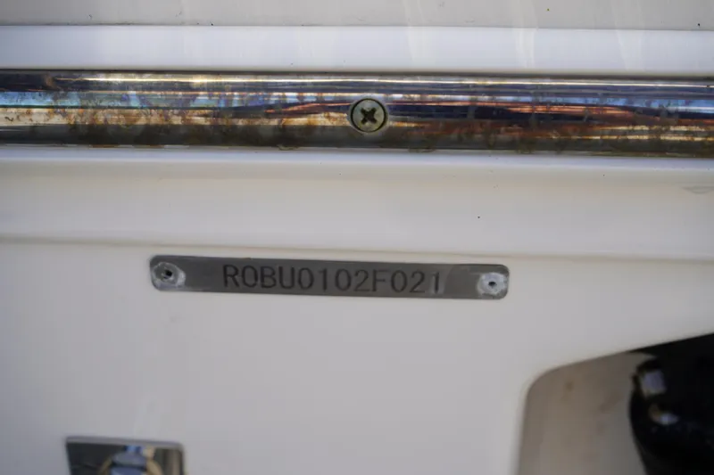 Slide: The Image of 2021 Robalo R230 Center Console boat identification plate with serial number. - 36