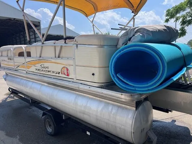 Slide: The Image of 2010 Sun Tracker PARTY BARGE 21 Signature Series pontoon boat with canopy and blue mat. - 3