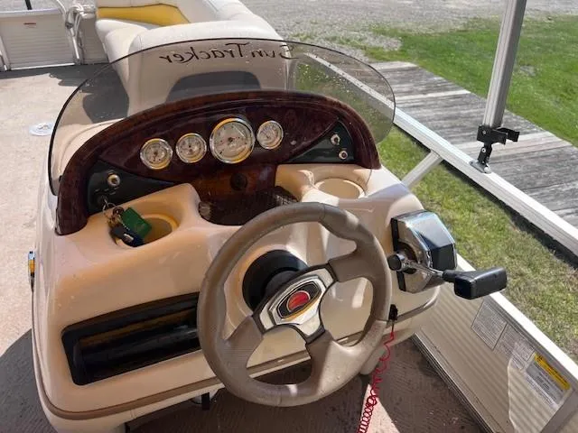 Slide: The Image of Steering console of 2010 Sun Tracker PARTY BARGE 21 Signature Series pontoon boat. - 5