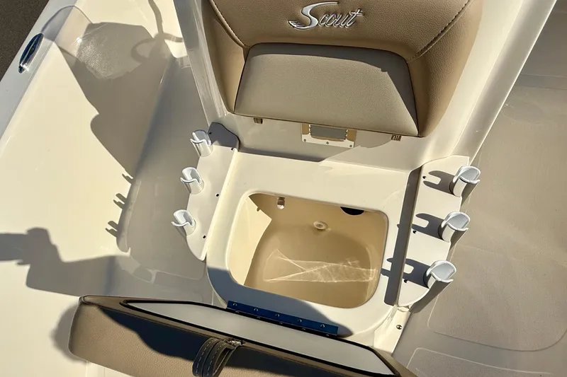 Slide: The Image of 2026 Scout 177 Sport boat interior with seating and rod holders. - 18
