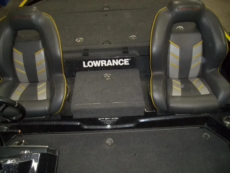 Slide: The Image of 2021 Nitro Z21 boat interior with Lowrance system and dual seats. - 14