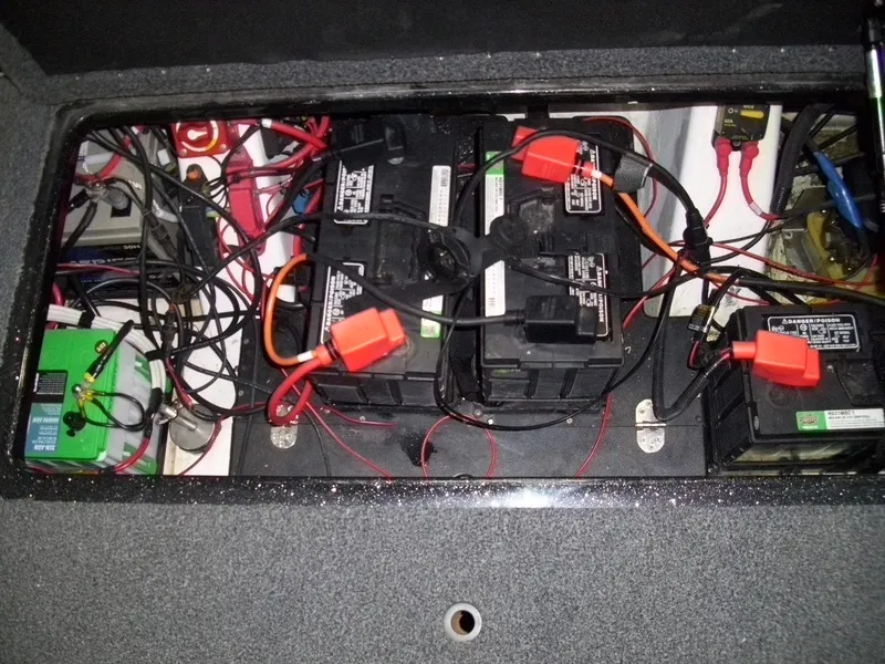 Slide: The Image of Battery compartment of a 2021 Nitro Z21 boat with wiring and connections. - 16