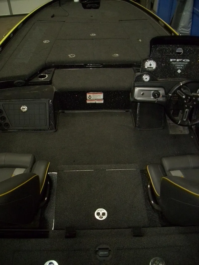 Slide: The Image of 2021 Nitro Z21 boat interior with dual seats and dashboard controls. - 17