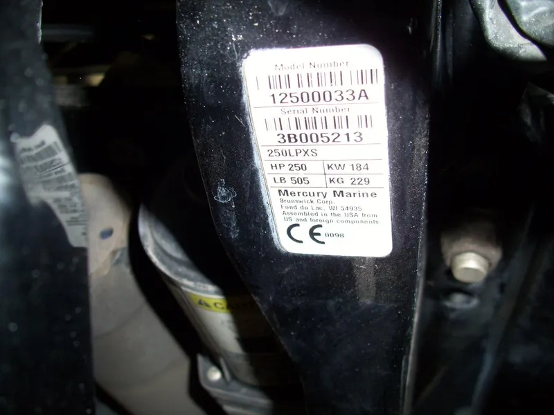 Slide: The Image of Label on a 2021 Nitro Z21 boat engine, showing model and serial numbers. - 4