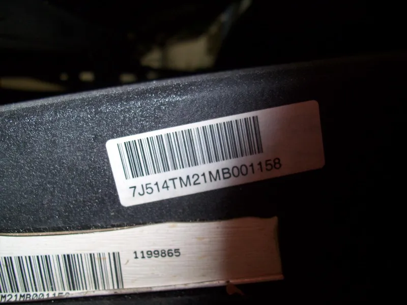 Slide: The Image of Barcode and serial number on 2021 Nitro Z21 boat component. - 6
