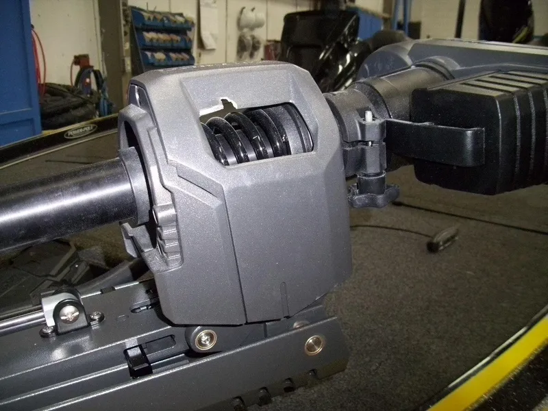 Slide: The Image of Close-up of a 2021 Nitro Z21 boat component in a workshop setting. - 7