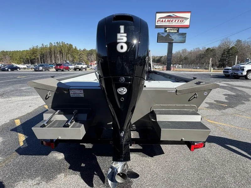 Slide: The Image of 2025 SeaArk 2072 MV Flat Cat boat with 150 HP engine in parking lot. - 6