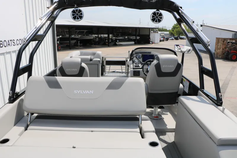 Slide: The Image of 2025 Sylvan L3 CLZ DH boat interior with modern seating and control panel. - 21