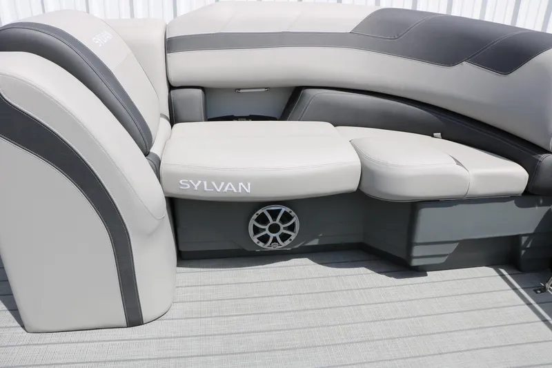 Slide: The Image of 2025 Sylvan L3 CLZ DH boat interior with gray seating and speaker detail. - 27