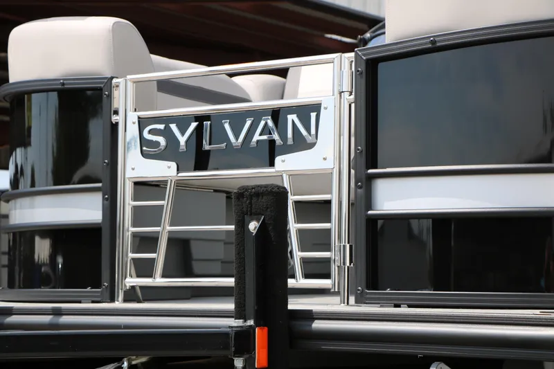 Slide: The Image of 2025 Sylvan L3 CLZ DH pontoon boat with sleek design and branding. - 7