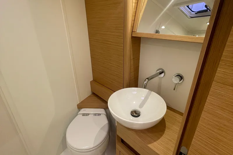 Slide: The Image of Modern bathroom in 2026 Grand Soleil 42 Long Cruise yacht with sleek fixtures. - 23
