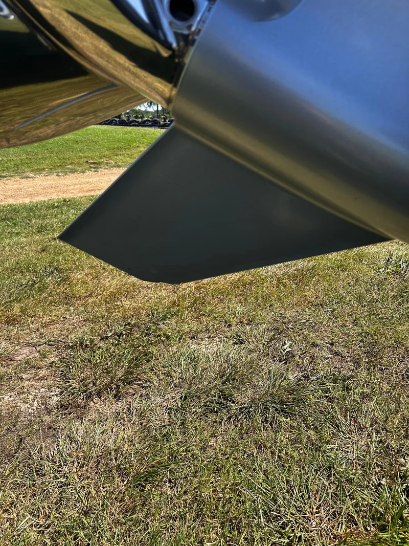 Slide: The Image of Close-up of 2024 Ranger Z519 boat propeller on grassy field. - 19