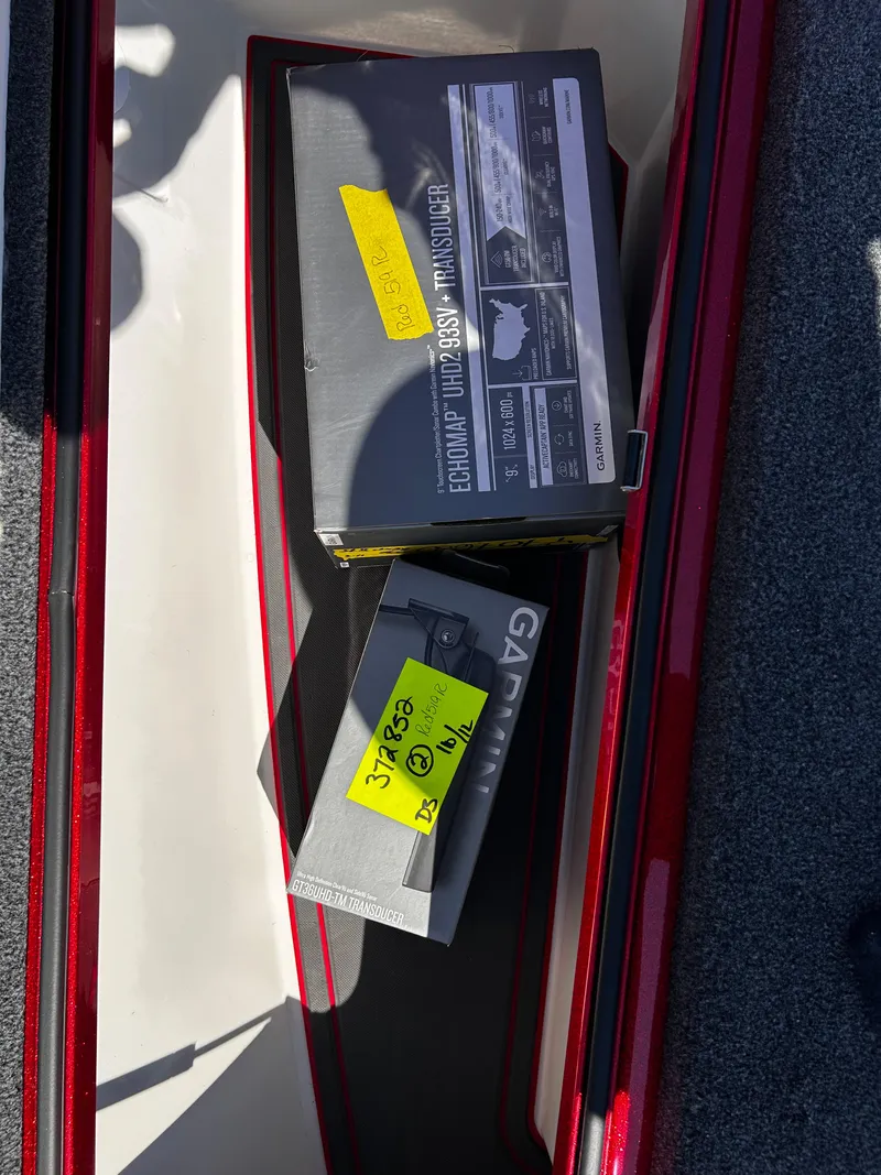 Slide: The Image of 2024 Ranger Z519 storage with Garmin transducer boxes inside. - 9