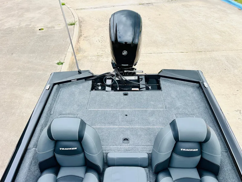 Slide: The Image of 2026 Tracker Pro Team 175 boat interior with dual seats and motor. - 29