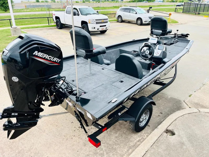 Slide: The Image of 2026 Tracker Pro Team 175 boat with Mercury engine, parked on a trailer. - 3
