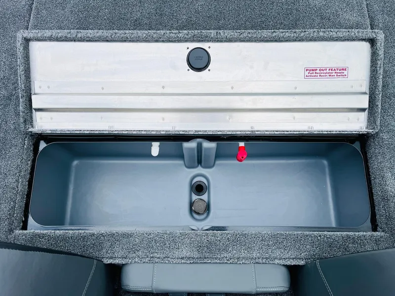 Slide: The Image of 2026 Tracker Pro Team 175 livewell with pump-out feature, gray interior. - 31