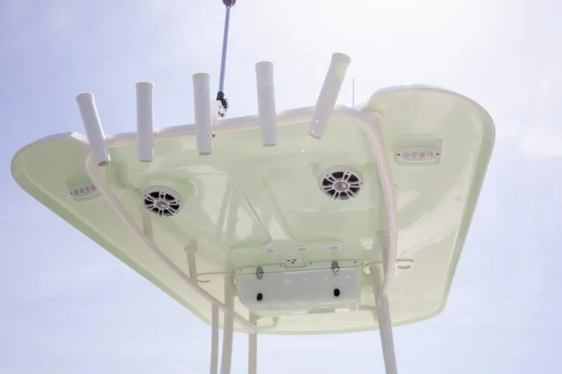 Slide: The Image of Manufacturer Provided Image: 2025 Parker 23SE Center Console boat top view with rod holders and speakers. - 10