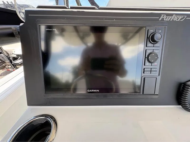 Slide: The Image of Garmin GPS display on 2025 Parker 23SE Center Console boat dashboard. - 16