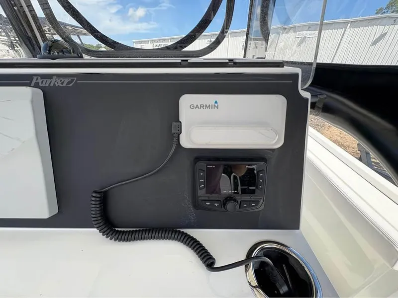 Slide: The Image of 2025 Parker 23SE Center Console with Garmin navigation system and control panel. - 17