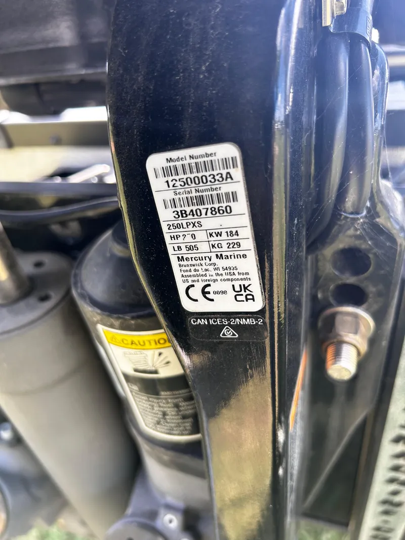 Slide: The Image of Label on a 2024 Triton 21XP boat, displaying model and serial numbers. - 14