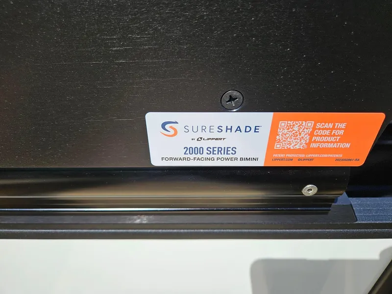 Slide: The Image of SureShade 2000 Series label on Harris Sunliner 230, 2025 model, with QR code for product info. - 22