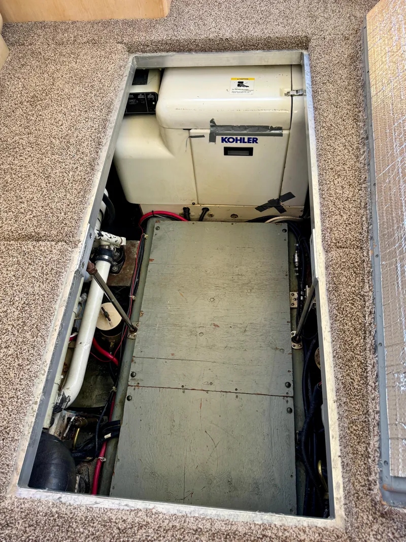 Slide: The Image of Engine compartment of 1997 Carver 405 Aft Cabin Motoryacht with Kohler generator. - 41