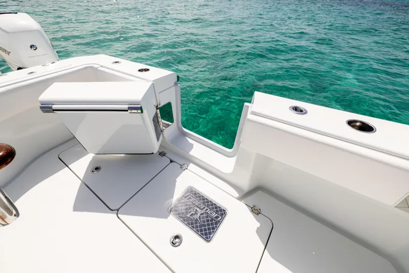 Slide: The Image of Freeman 37 VH 2022 boat deck with ocean view, featuring sleek white design. - 30